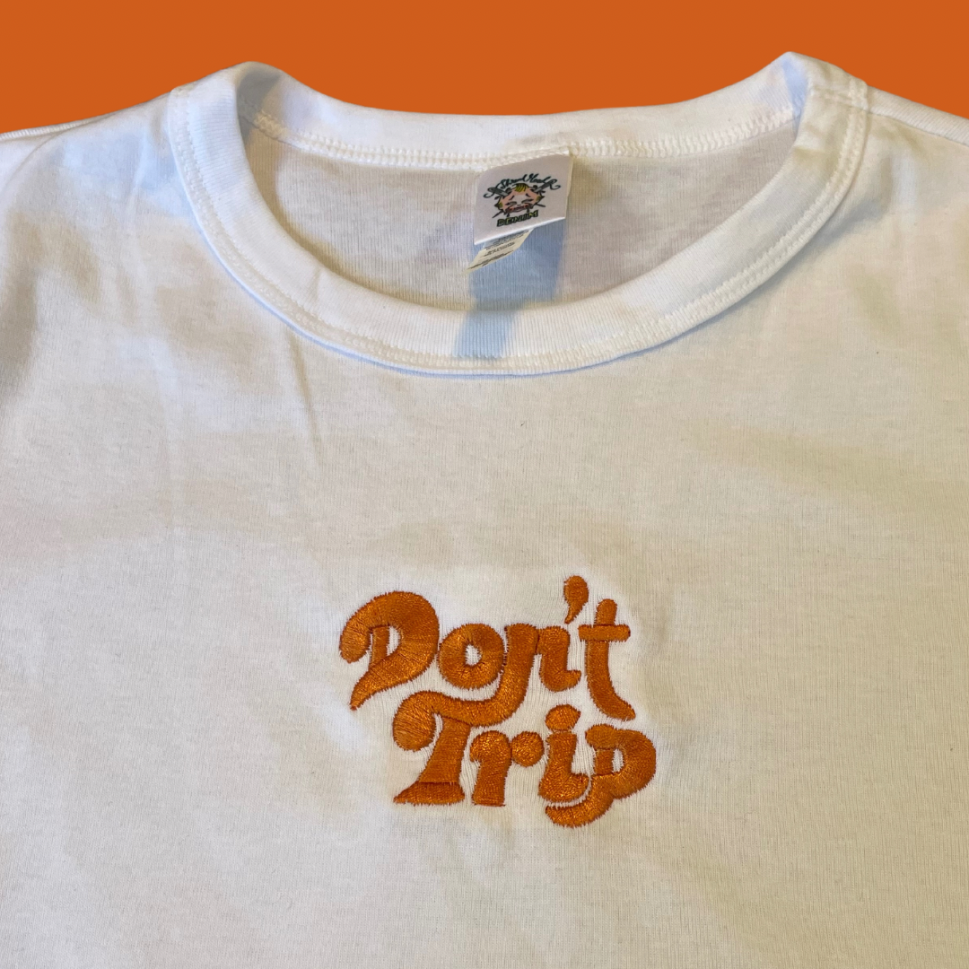Don't Trip Embroidered Womans Baby Doll Tee