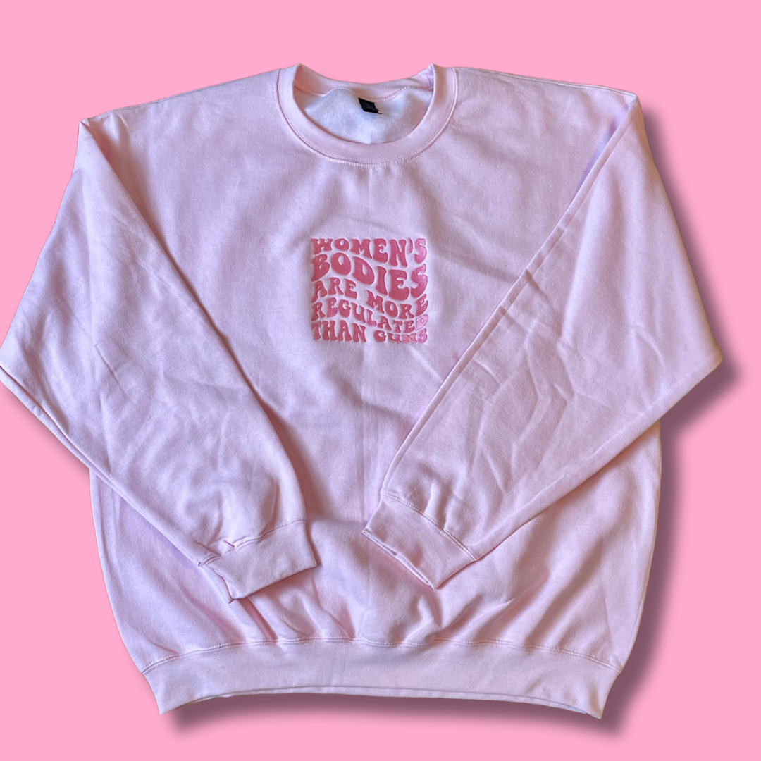 Women's Bodies Are More Regulated Than Guns Embroidered Unisex Crewneck Sweatshirt