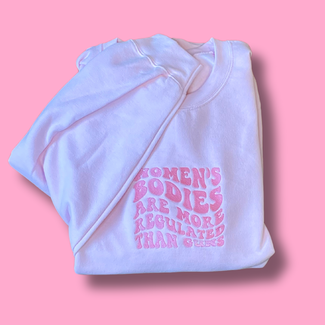Women's Bodies Are More Regulated Than Guns Embroidered Unisex Crewneck Sweatshirt