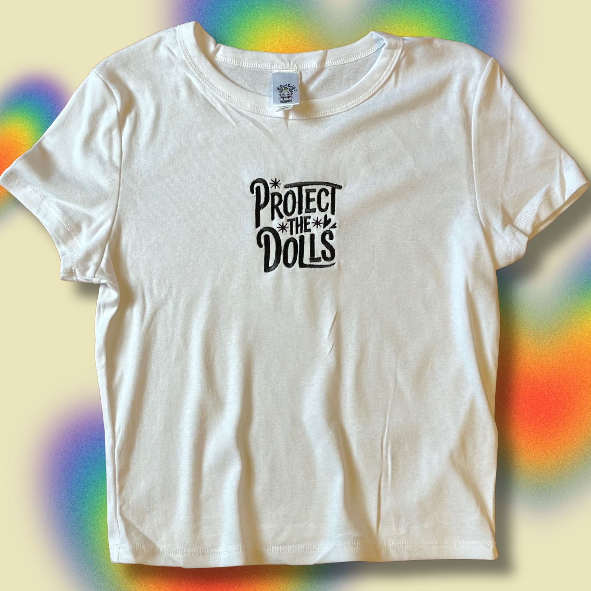 Protect The Dolls Embroidered Baby Tee Unisex T-Shirt – Thread